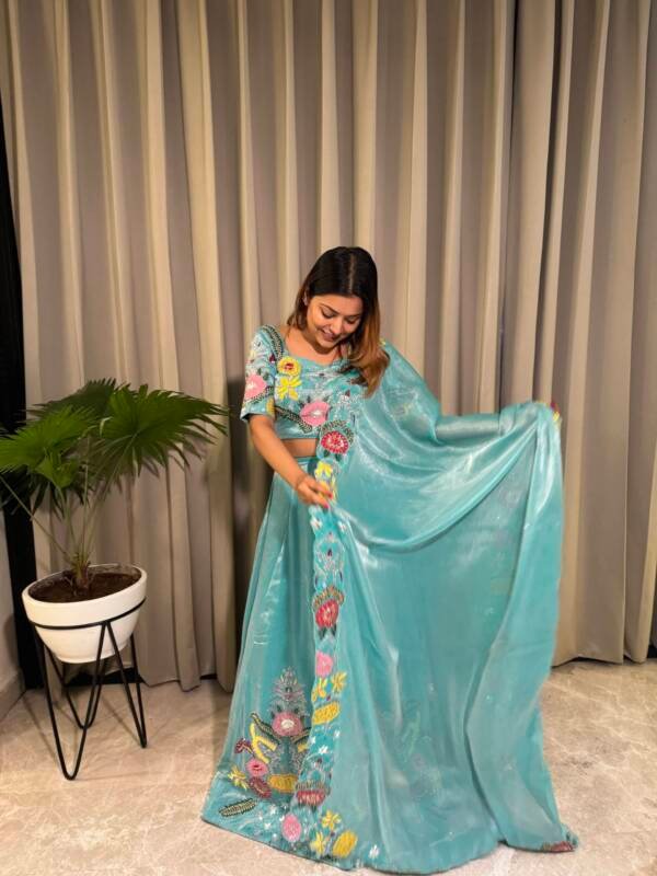 Bling Lehanga With Floral Motifs and Vibrant Patchwork in Tissue Organza Teal Blue
